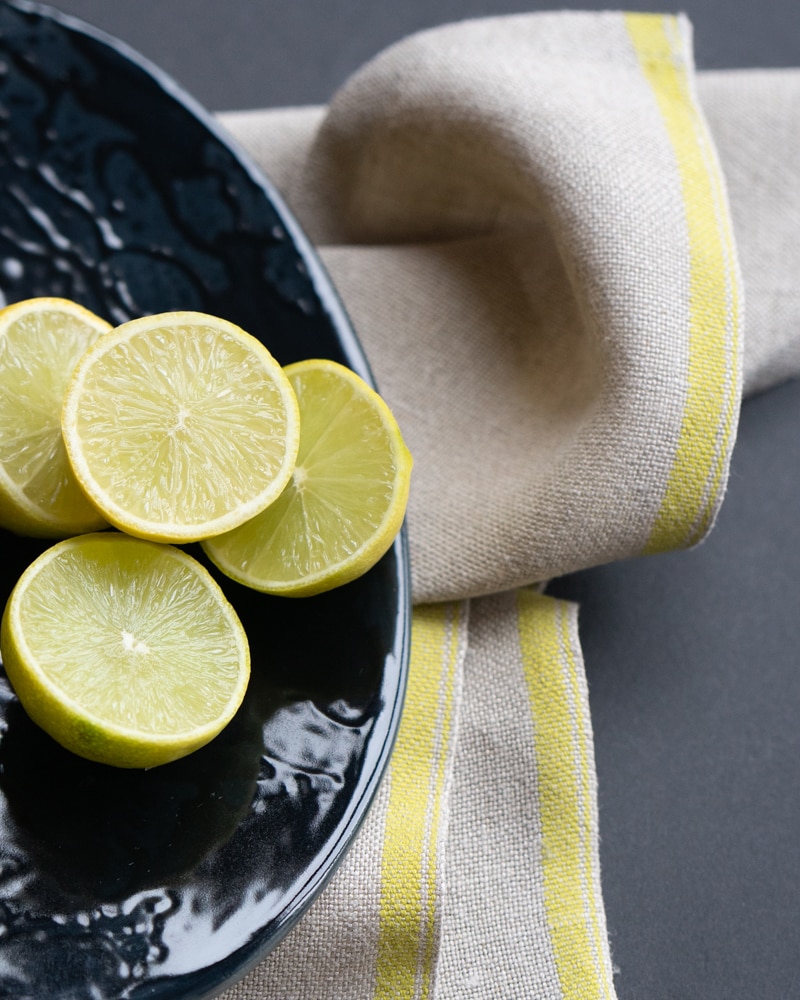 Flax Selvedge Napkins with a Citronelle stripe that runs along the true selvedge, woven at the Mungo Mill on antique Ruti looms