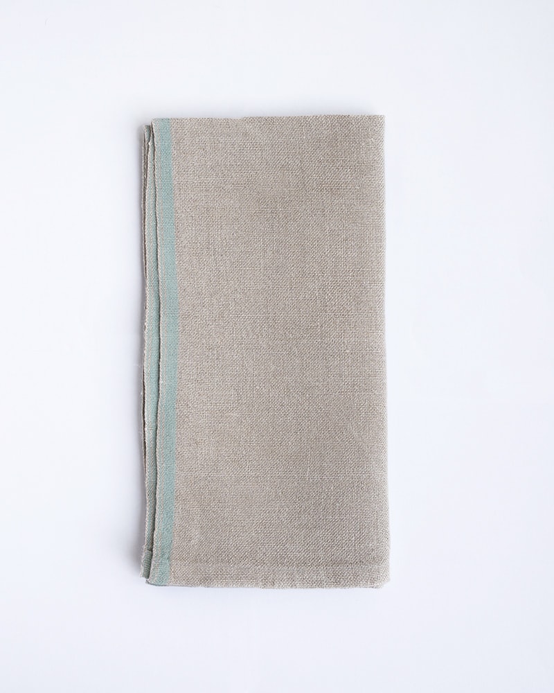 Flax Selvedge Napkins with a Duck Egg stripe that runs along the true selvedge, woven at the Mungo Mill on antique Ruti looms