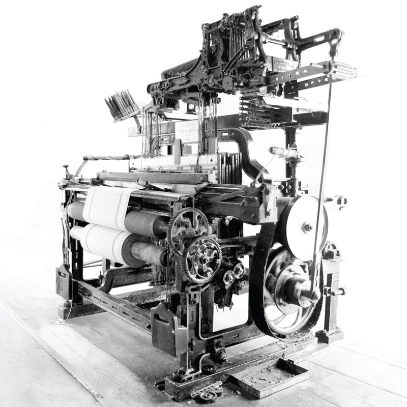 The antique Lancashire looms which we use to weave fabric at the Mungo mill in Plettenberg Bay