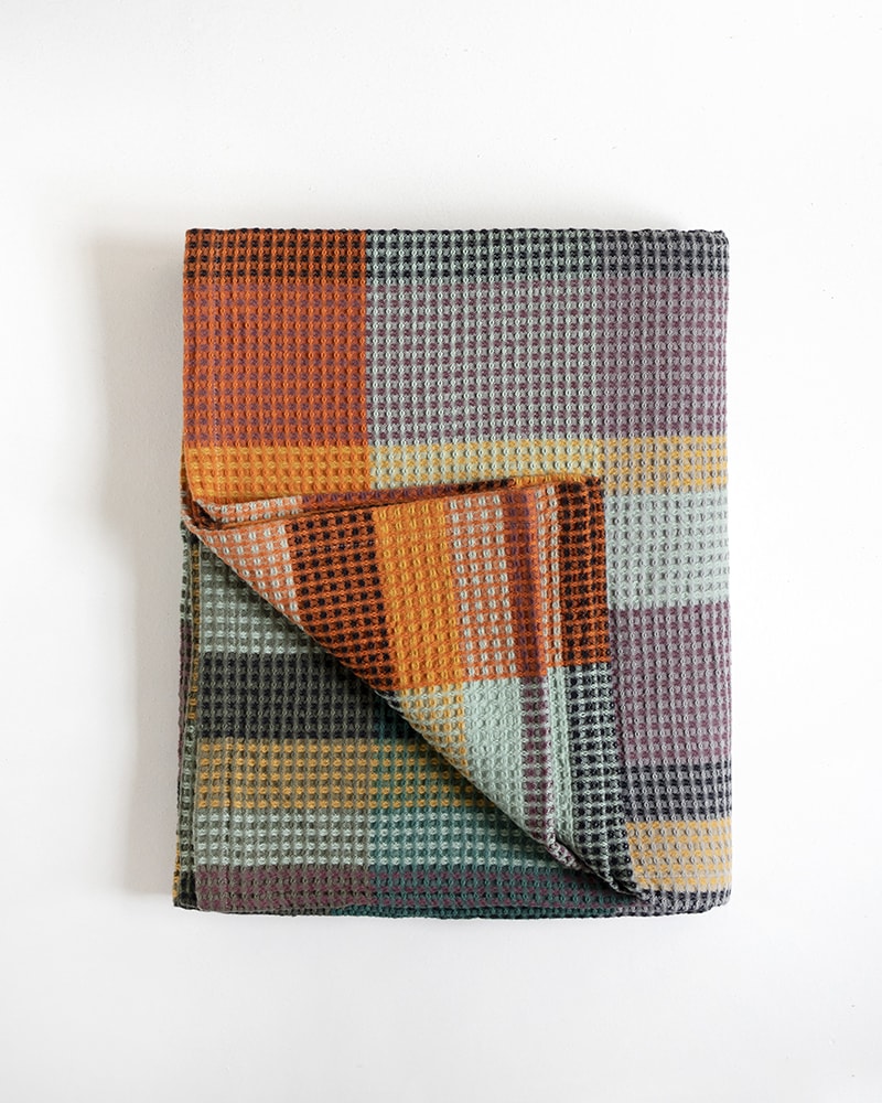 A textural, colourful pure cotton blanket - the Vrou Vrou. Now in Cypress colourway. Worldwide shipping available