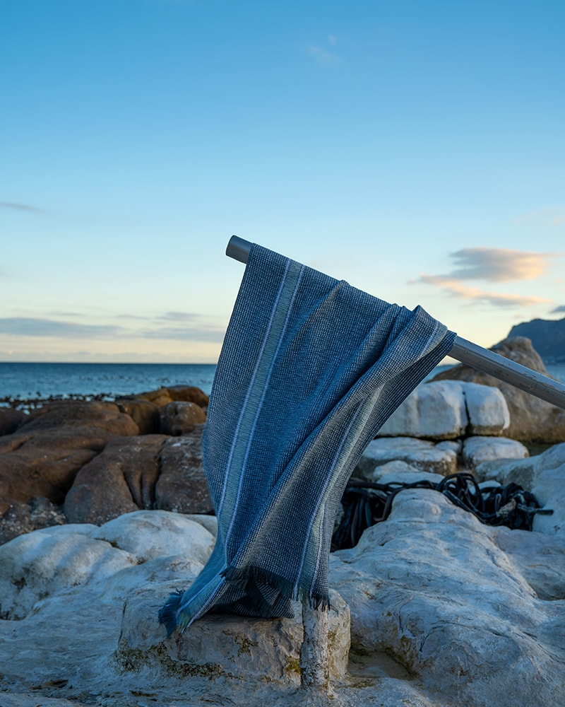 At the beach with the Mungo Summer Towel - GOTS-certified organic cotton towel, woven at the Mungo Mill in Plettenberg Bay