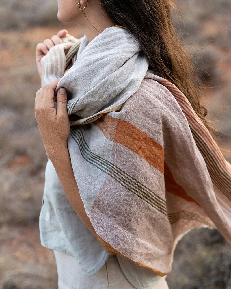 Model showcasing Mungo Clay scarf